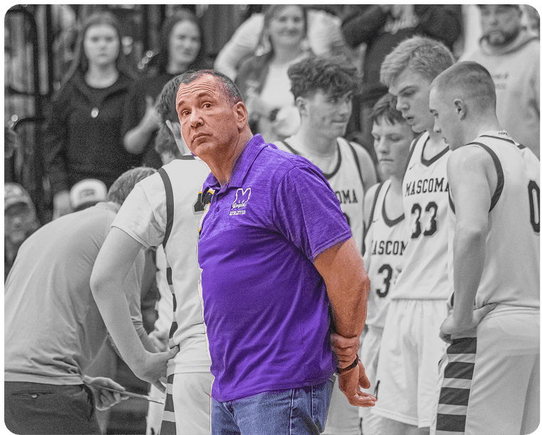 Coach Joe working one-on-one with a student athlete